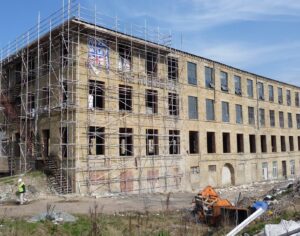 Jubilee mill, Batley, surrounded by scaffolding