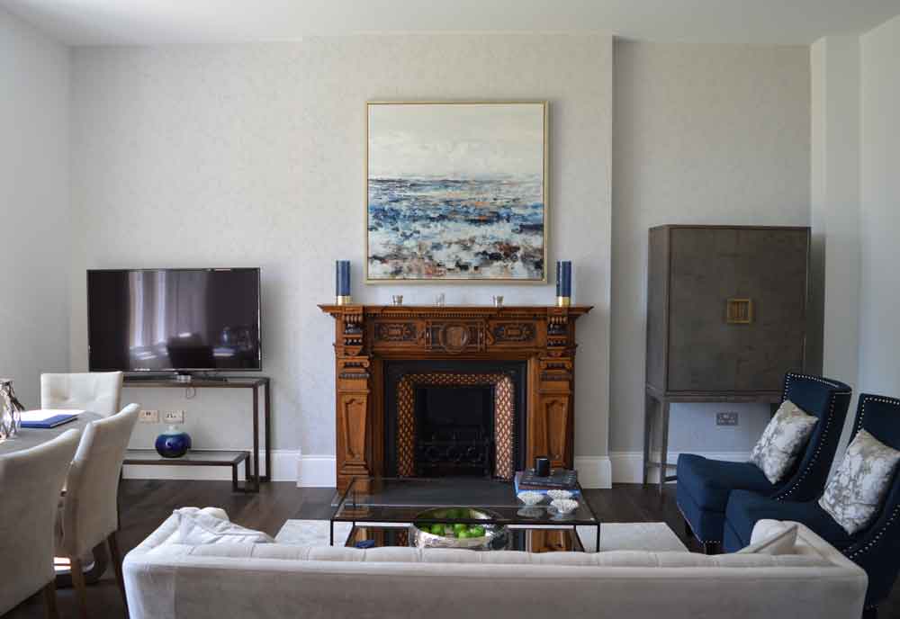 living area with tv, fireplace and soafa