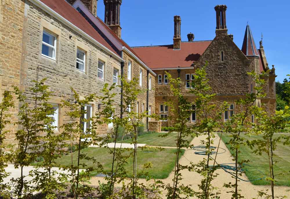 side on view of a a manor house