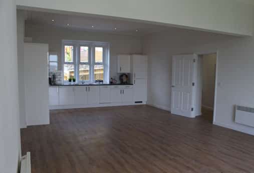 open plan living area with kitchen