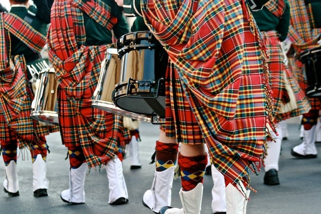 scotlands people in kilts playing the drums